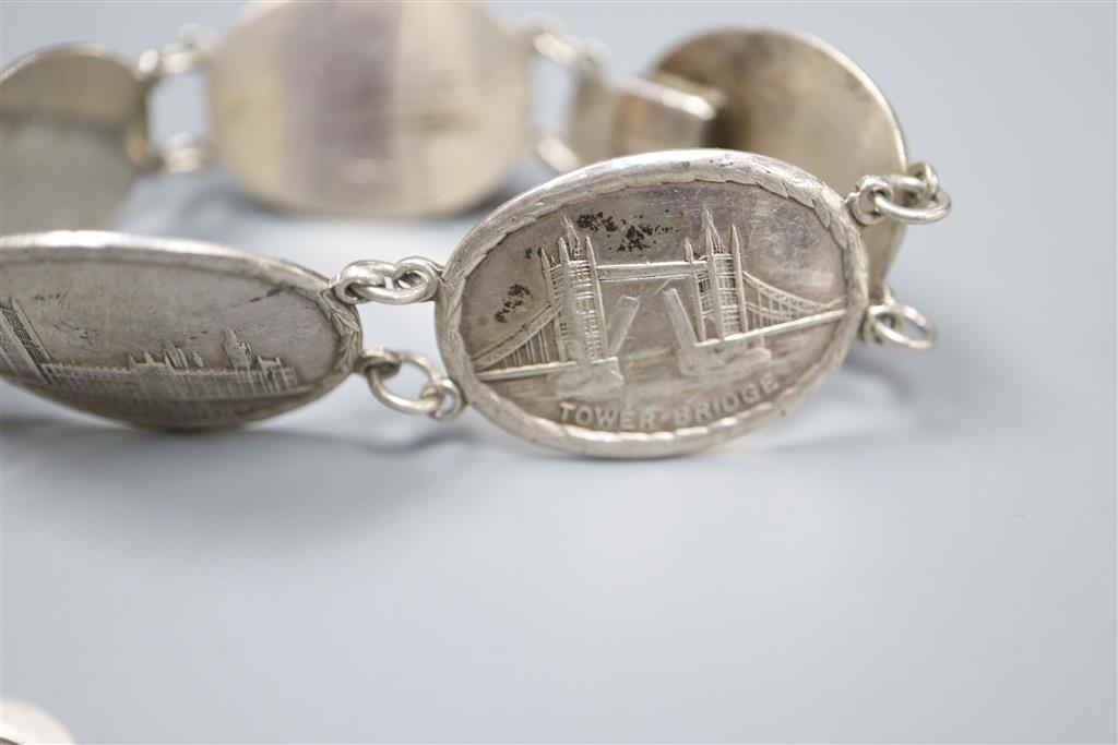 A stylish 925 brooch, silver monument bracelet, charm bracelet etc.